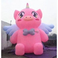 Custom large inflatable pink pig with wings for outdoor event